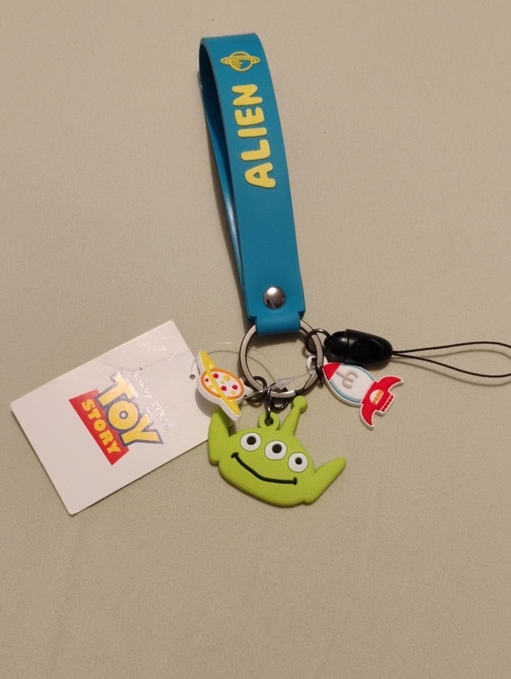 Toy Story Alien Blue Wrist Strap Keychain with Green Alien Charm